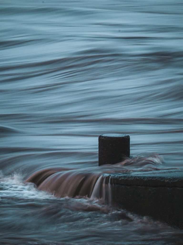 Image of a submarine emerging from the water.