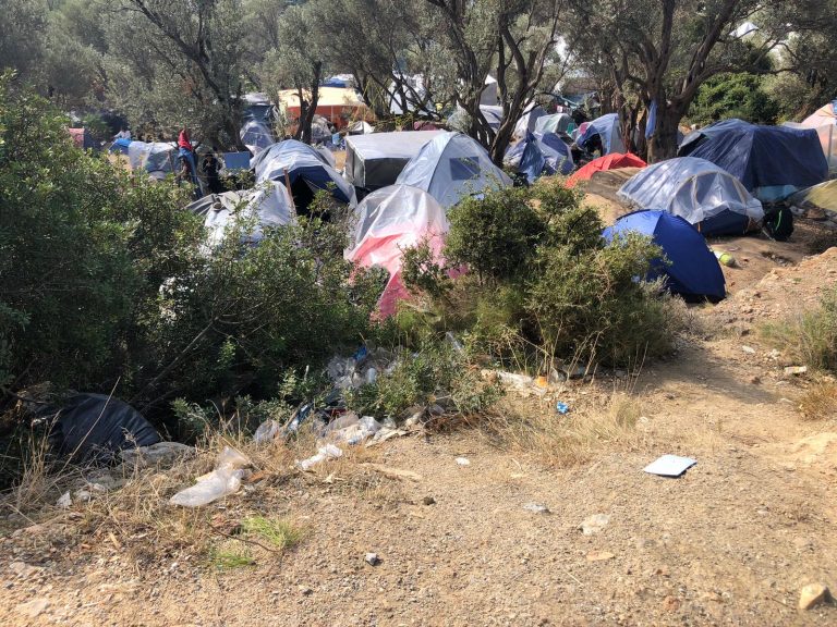 camps in field, outskirts of Greece